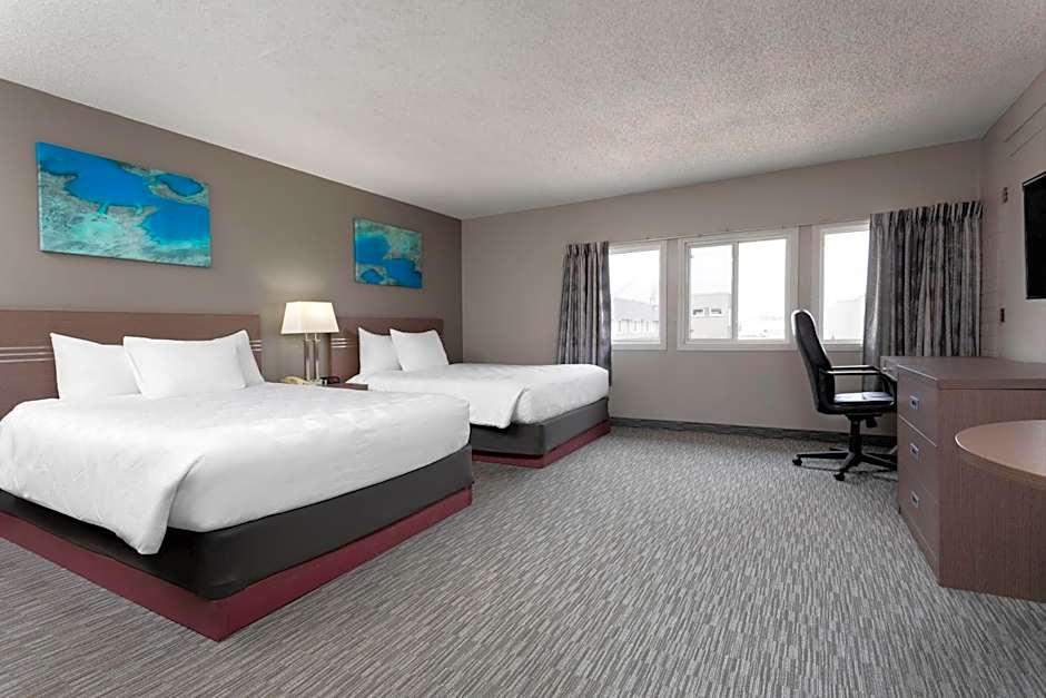 Photo 1 of 5 of Deluxe 2 Queen Beds and 1 Double Bed, Nonsmoking