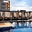 Olivia Palm Hotel