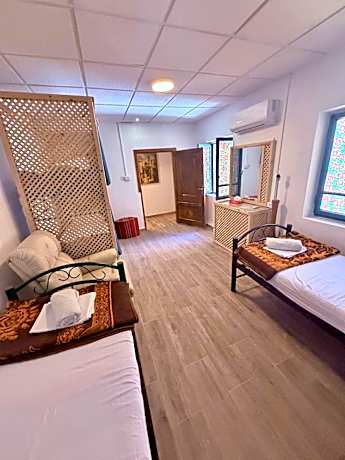 Quad Bedroom with Shared Bathroom