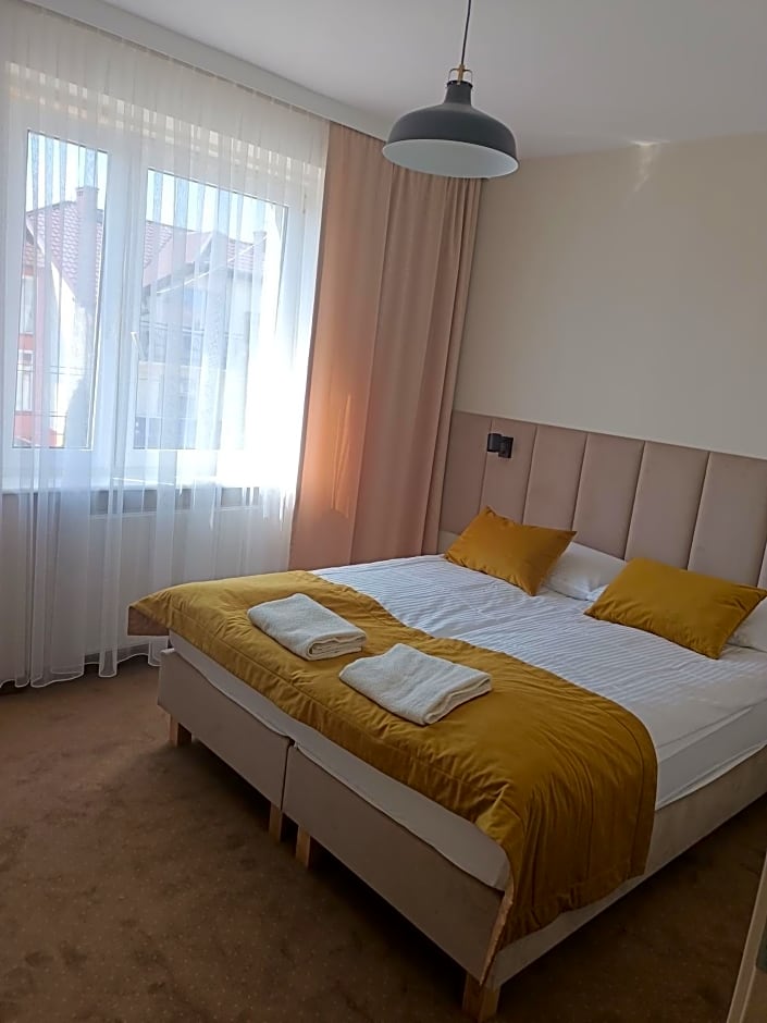 Pokoje Gościnne u MARCINA- sala zabaw, basen, melex, rowery, grill, mini dmuchaniec