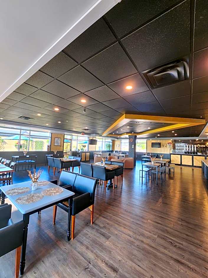 Merit Hotel & Suites