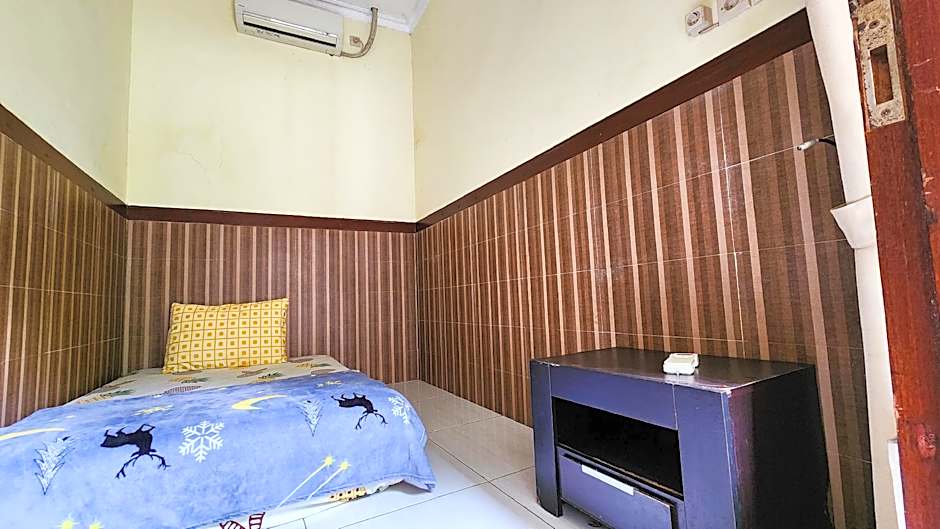 Homey Guesthouse near Sby Zoo (Syariah) 