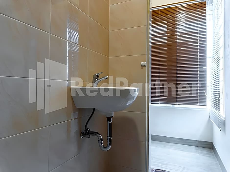 Adam Malik Guesthouse near Regale ICC Medan Mitra RedDoorz