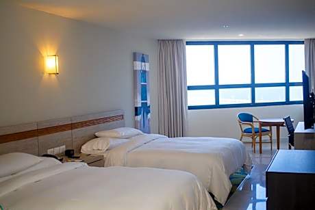 Queen Room with Two Queen Beds and Beach View