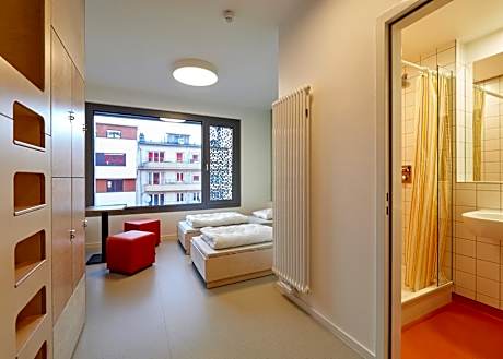 Single Bed in Female Dormitory Room