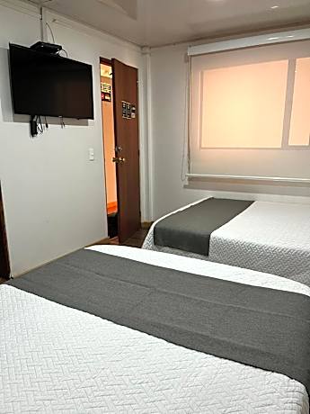 Quadruple Room with Private Bathroom
