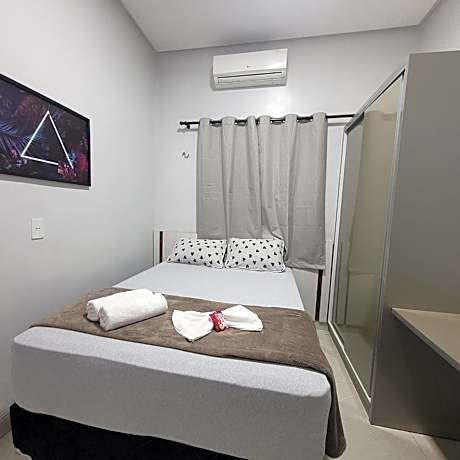 Quarto 6 econômico próximo do aeroporto ar condicionado cama de casal