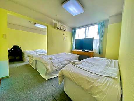 Quadruple Room with Private Bathroom