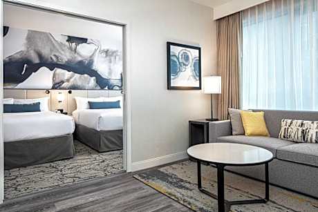 Deluxe Queen Suite with Two Queen Beds and Sofa Bed - City View