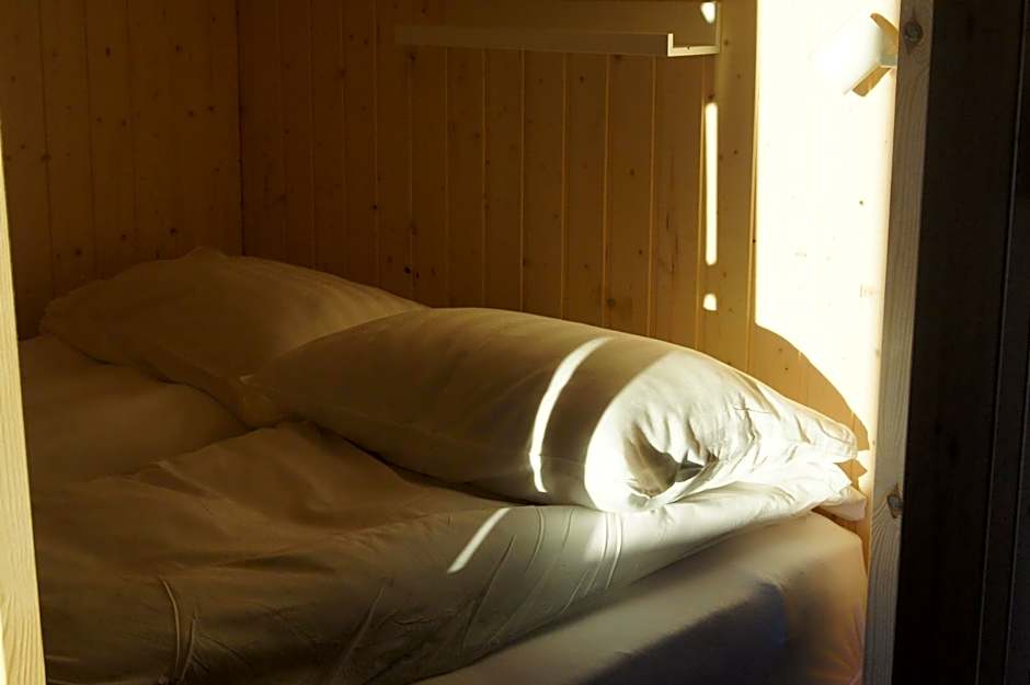Photo 1 of 8 of Bed in 8-Bed Female Dormitory Room