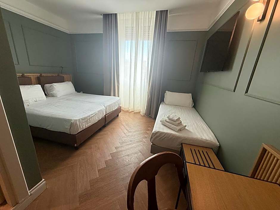 Photo 1 of 7 of Triple Room