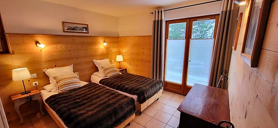 Chez Philippe - Appartements et Chalets - Panoramic Village vue Glaciers