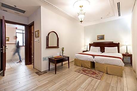 Deluxe Room (2 Adults + 1 Child)