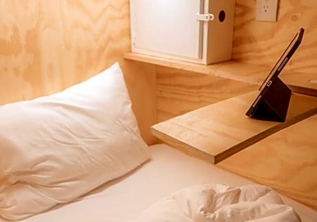 Single Bed in Female Dormitory Room