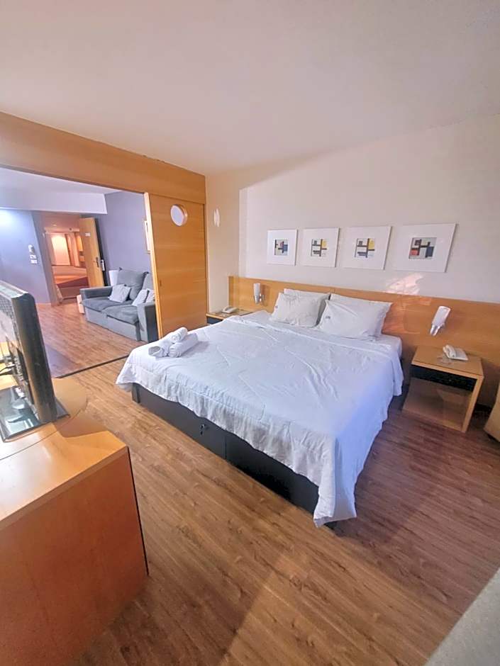 Flat no Golden Tulip By Rei dos Flats