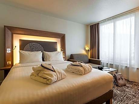 Executive Quadruple Room with Queen Bed and Double Sofa Bed