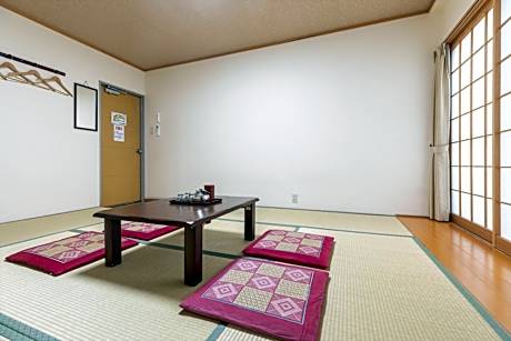 Quadruple Room with Shared Bathroom