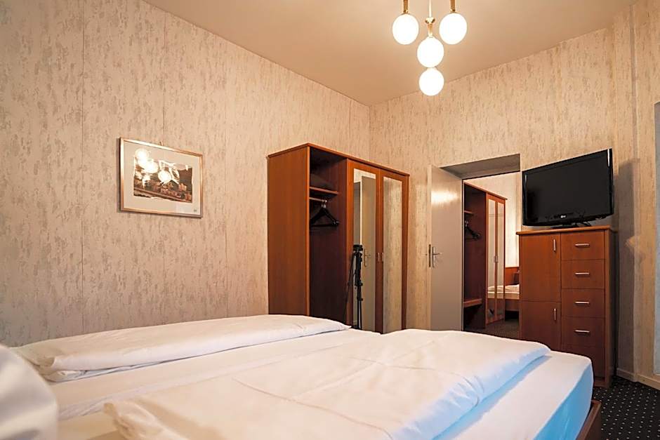 Photo 1 of 13 of Triple Room with Private Bathroom