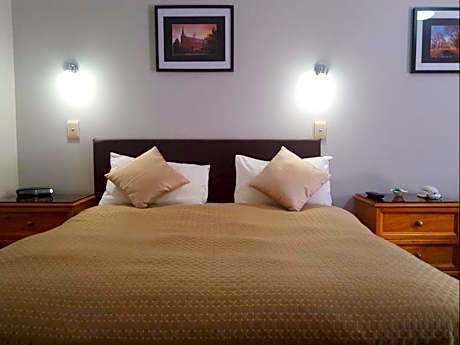 Queen Room with One Queen Bed and One Double Bed