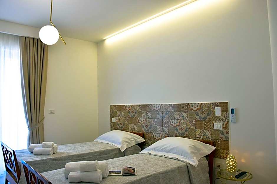 Accòmodati - Camere e Appartamenti