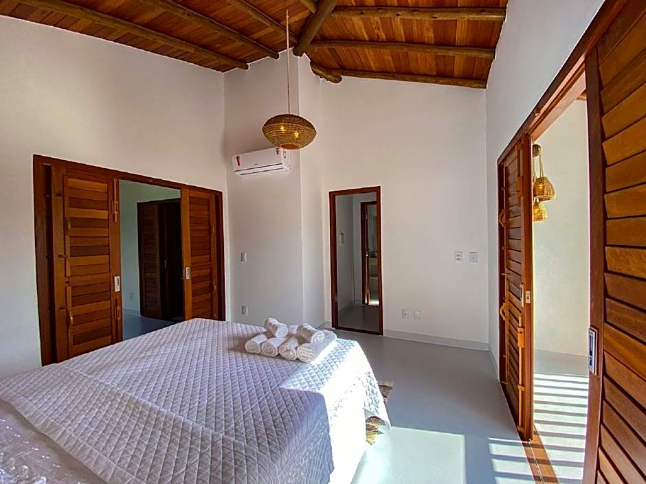 Casa Espaçosa com Piscina e Sauna Privativa! 6 Suítes!