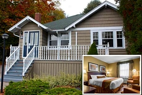 Three Bedroom Executive Cottage with One King Bed, One Queen Bed, Two Twin Beds, and Kitchen