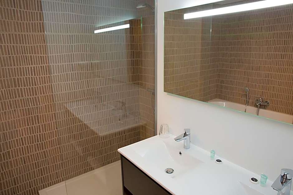 Appart hôtel En Ville