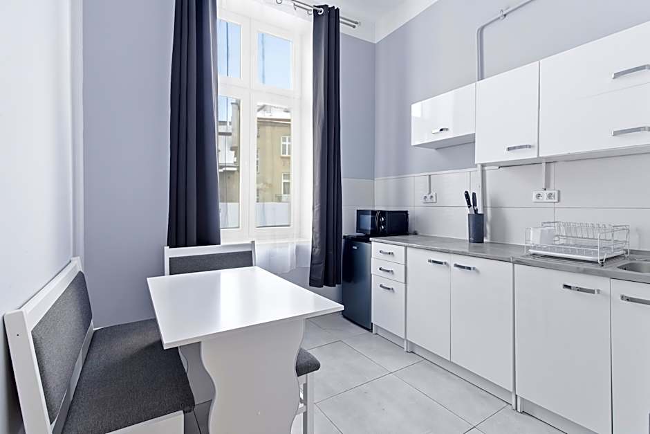 Queen Apartments