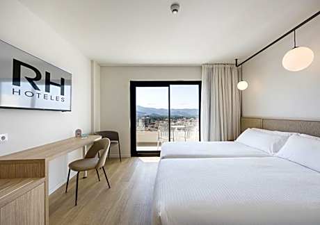 Quadruple Room (3 Adults + 1 Child)