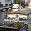 HouseBoat next to AMSTEL