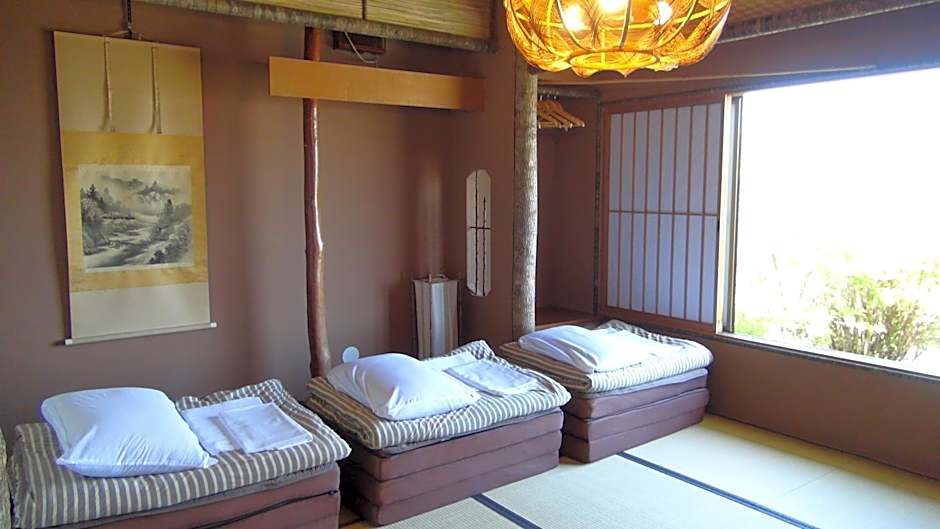 Photo 1 of 3 of Basic Triple Room with Shared Bathroom