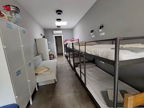 Single Bed in Dormitory Room