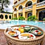 ROYAL PINEAPPLE HOTEL l a welcome to wealth and good fortune