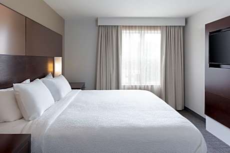 One-Bedroom King Suite with Sofa Bed - Mobility Accessible with Roll-In Shower