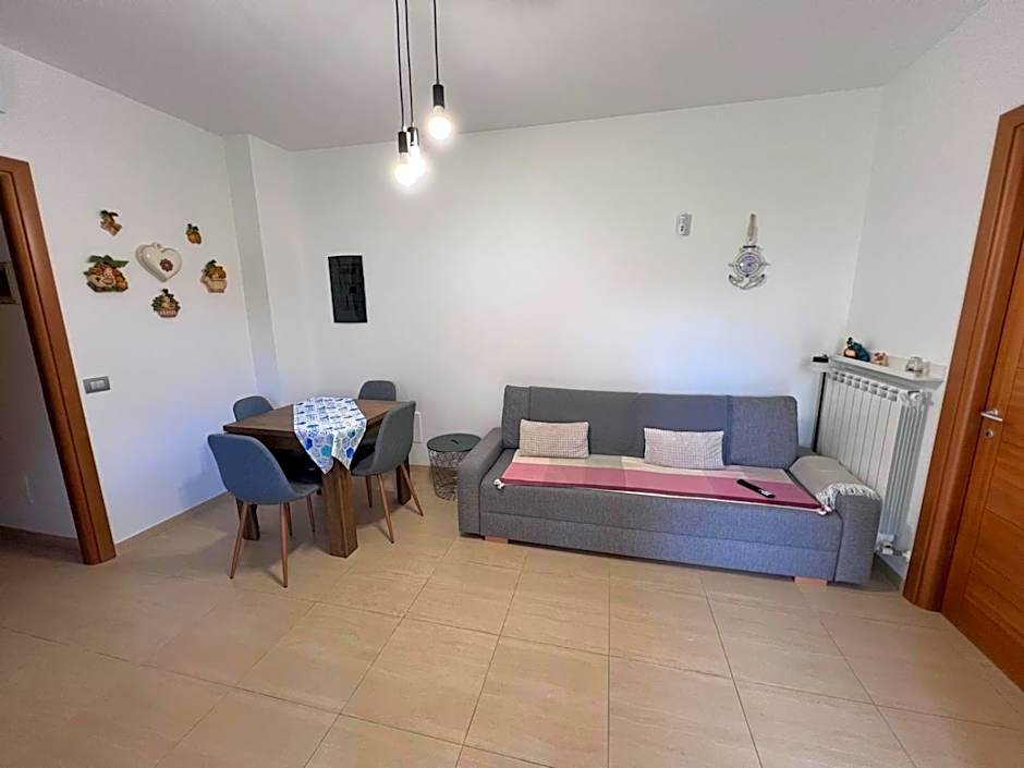 Casa Antia, nuovo bilocale con giardino in Residence con piscina