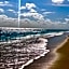 Tropical Beach Condo - Pool, Shops, 86" TV, WiFi