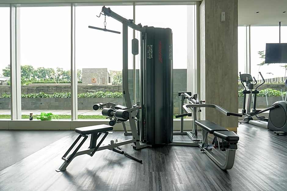 Well Design and Homey 1BR Ciputra International Apartment By Travelio