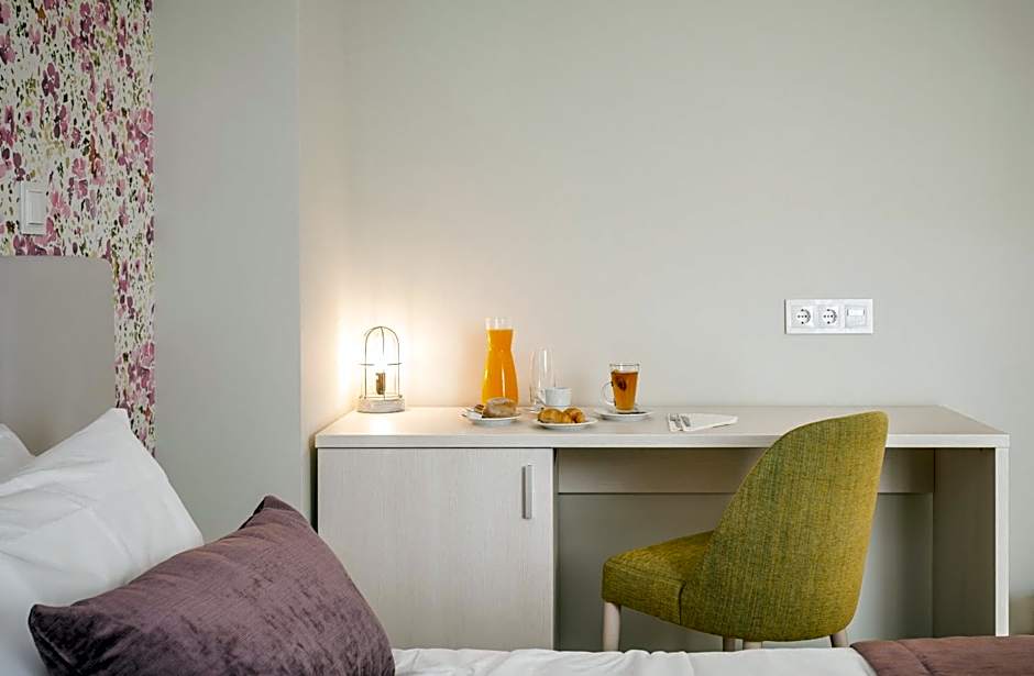 Essence Inn Marianos Hotel