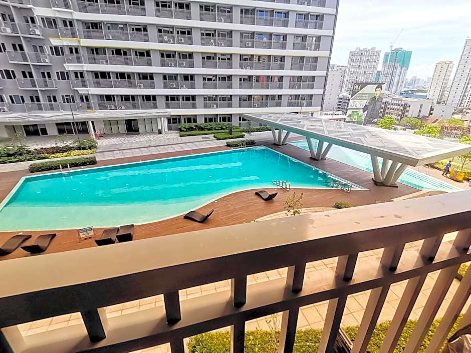 Stylish 1 Bedroom Condo Unit with Perfect Pool View Balcony at Fame Residences