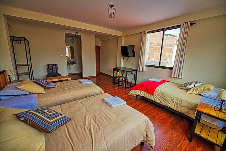 Photo 1 of 2 of Triple Room with Private Bathroom