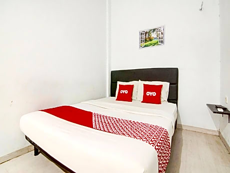 OYO 90310 Cosmo Harmoni