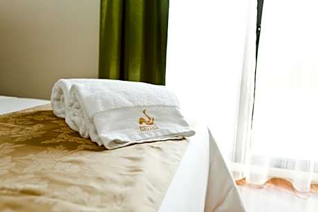 Triple Room (2 Adults + 1 Child)