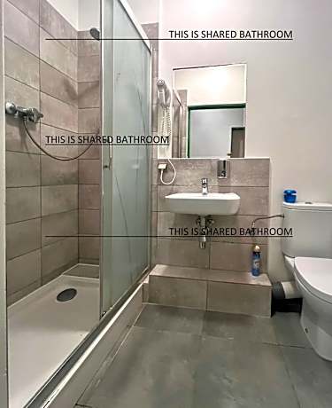 Quadruple Room with Shared Bathroom