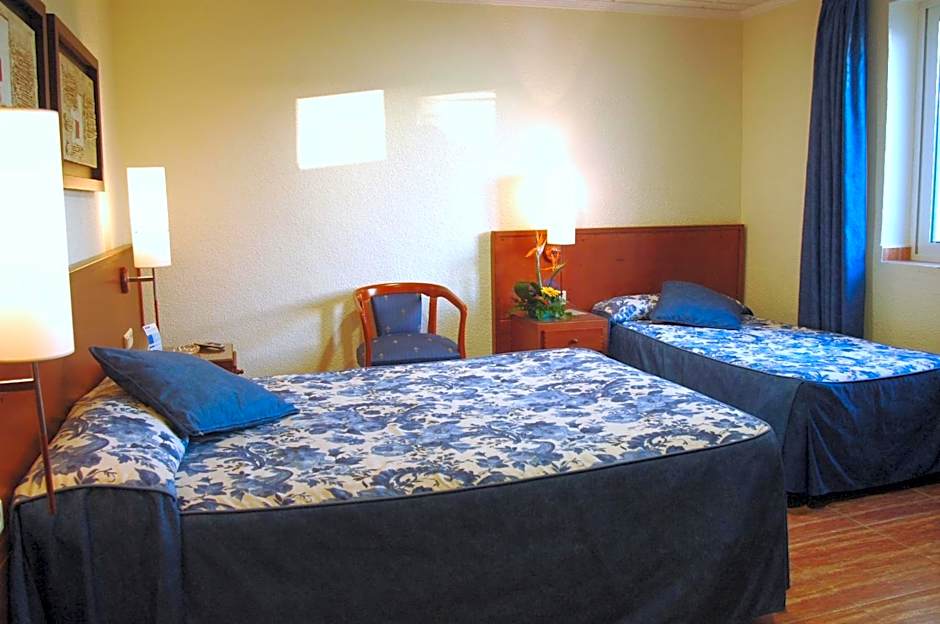 Photo 1 of 2 of Triple Room