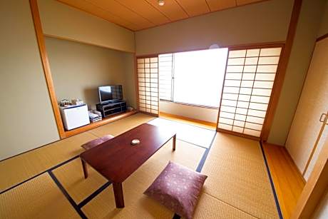 Quadruple Room with Shared Bathroom