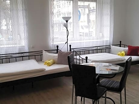 Quadruple Room with Shared Bathroom