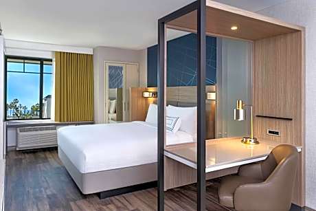 King Suite with Partial Ocean View, Trundle Sofa and Balcony