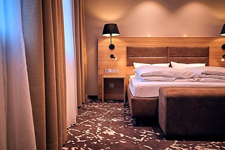 Photo 1 sur 5 de Triple Room