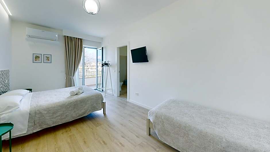 Accòmodati - Camere e Appartamenti