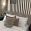 Happy Inn Rooms & Suites